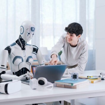 A Boy studies with the help of a Robot. The result is fruitful. Robot and Human Collaboration Concept.