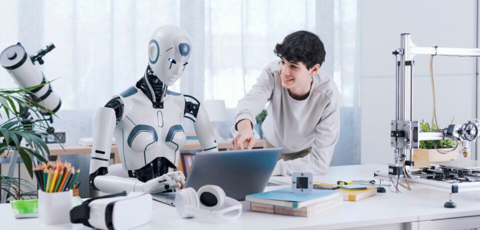 A Boy studies with the help of a Robot. The result is fruitful. Robot and Human Collaboration Concept.